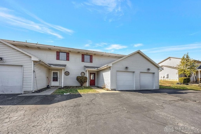 view of front of home with an attached garage and driveway