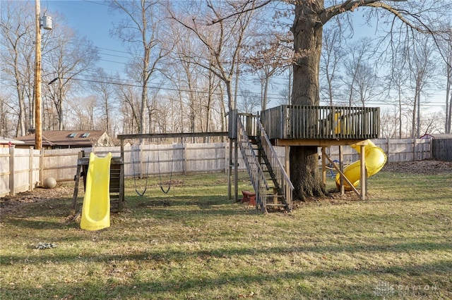 view of yard featuring a playground and a fenced backyard