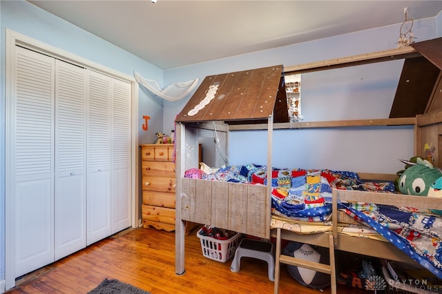 bedroom featuring wood finished floors