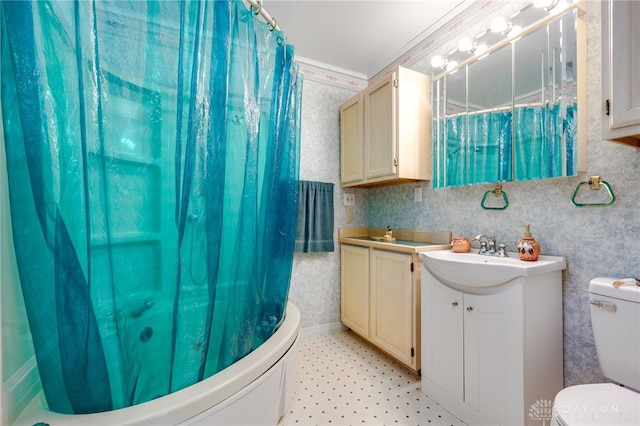 full bathroom with tile patterned floors, toilet, crown molding, wallpapered walls, and vanity