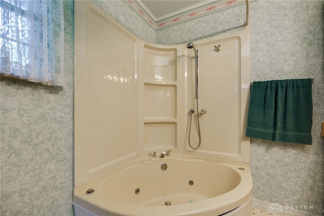 bathroom with wallpapered walls and a combined bath / shower with jetted tub