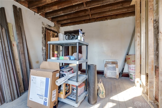 basement with wood-type flooring