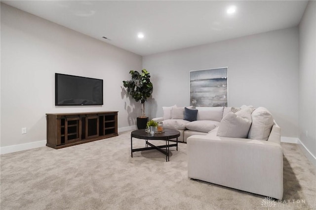 living room with carpet flooring, recessed lighting, visible vents, and baseboards