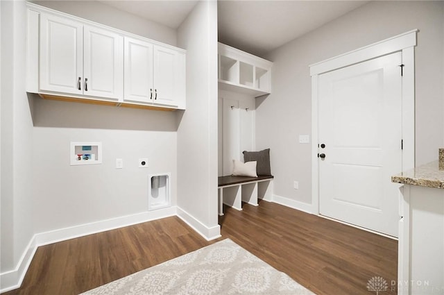 laundry area featuring baseboards, dark wood finished floors, hookup for a washing machine, cabinet space, and hookup for an electric dryer