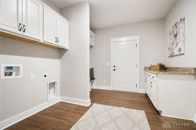 washroom with baseboards, washer hookup, dark wood-style floors, cabinet space, and hookup for an electric dryer