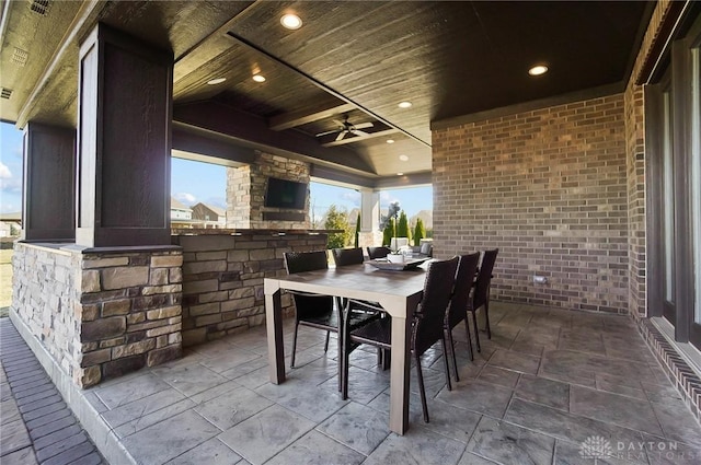 view of patio / terrace with outdoor dining space and a ceiling fan