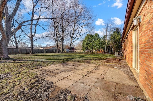 view of patio featuring cooling unit and fence