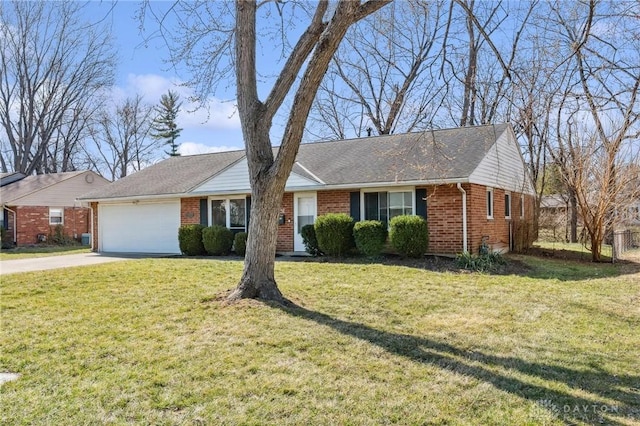 single story home with a front lawn, brick siding, concrete driveway, and an attached garage