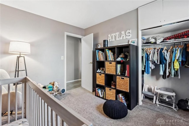 carpeted bedroom with a closet