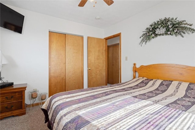 carpeted bedroom featuring a ceiling fan and a closet