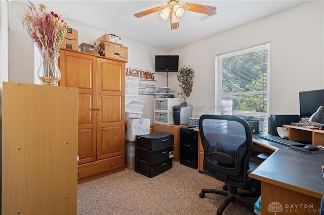 office space with light carpet and ceiling fan