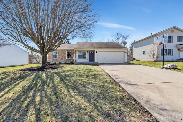 view of front facade with a front yard, brick siding, a garage, and driveway