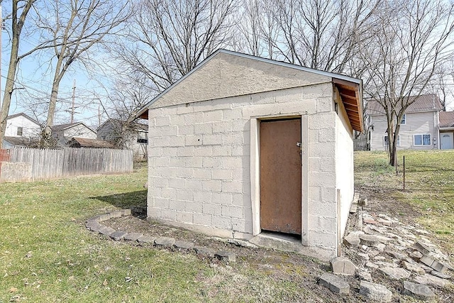 view of shed with fence