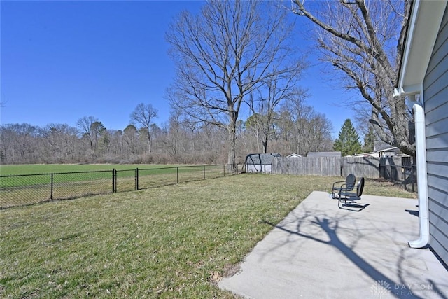 view of yard featuring a patio and a fenced backyard