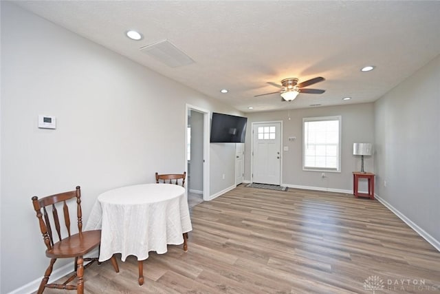 dining area featuring recessed lighting, baseboards, ceiling fan, and light wood finished floors