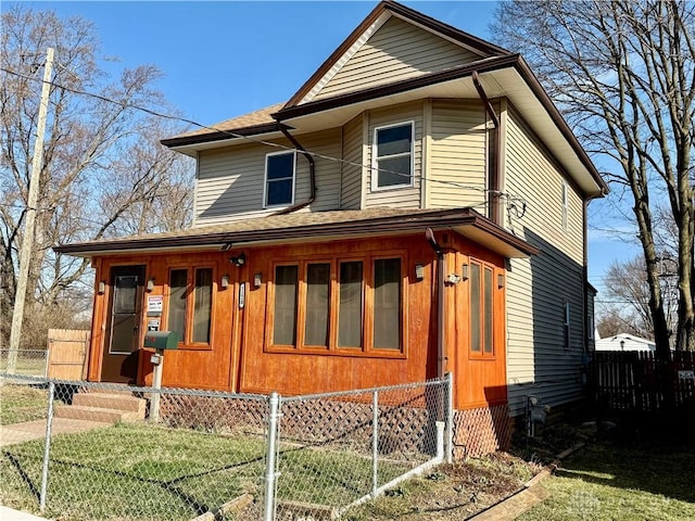 view of front of property with a fenced front yard