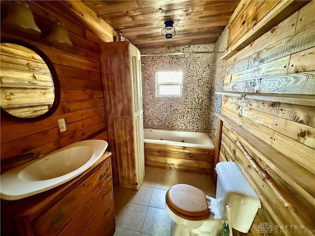 full bath featuring vanity, shower / bath combo with shower curtain, wood walls, wooden ceiling, and tile patterned floors