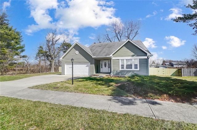 ranch-style house featuring a garage, concrete driveway, a front yard, and fence