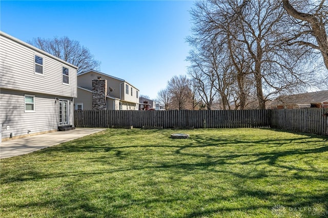 view of yard featuring a patio and a fenced backyard