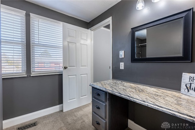 bathroom with visible vents, baseboards, and vanity