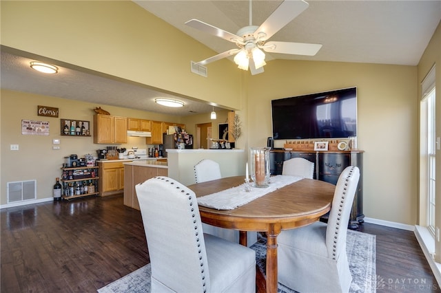 dining space with visible vents, dark wood-style flooring, ceiling fan, and vaulted ceiling