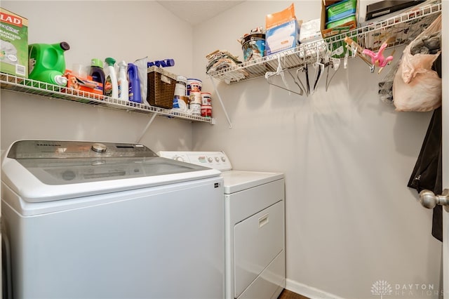 laundry room featuring laundry area and washing machine and dryer