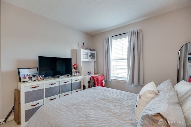 bedroom featuring a textured ceiling