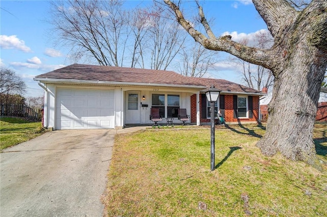 ranch-style house with fence, driveway, a front lawn, a garage, and brick siding