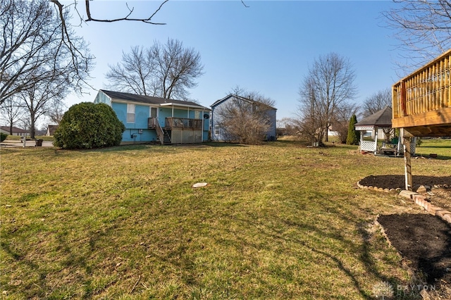 view of yard featuring a deck