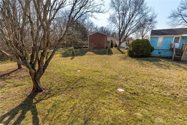 view of yard featuring a wooden deck