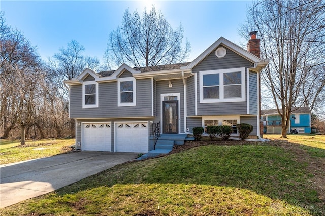 split foyer home with a chimney, concrete driveway, a garage, and a front yard