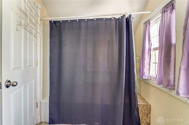 full bath with plenty of natural light