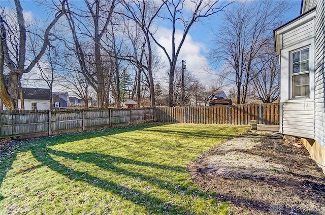 view of yard featuring a fenced backyard