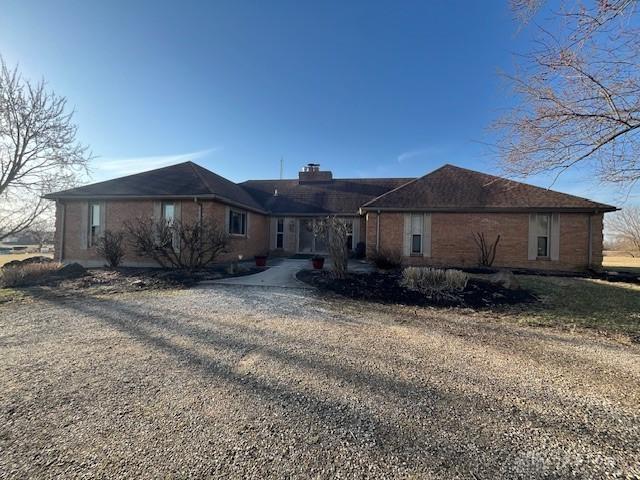 exterior space featuring dirt driveway