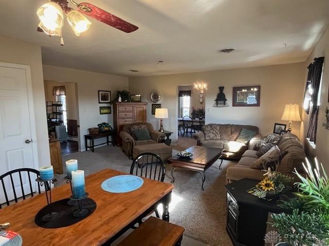 dining area featuring a ceiling fan and visible vents