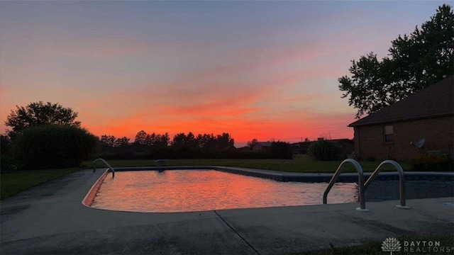 outdoor pool featuring a patio