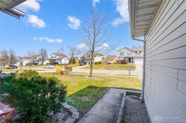 view of yard with a residential view