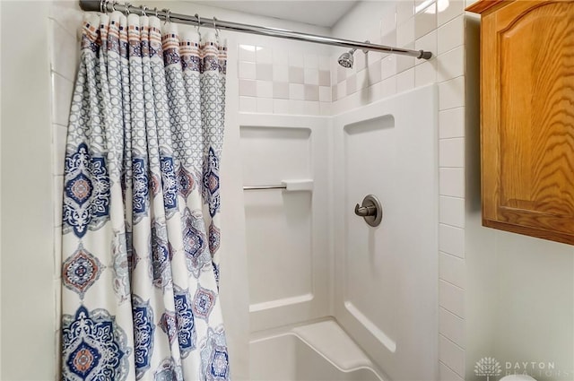 full bathroom with a shower with shower curtain