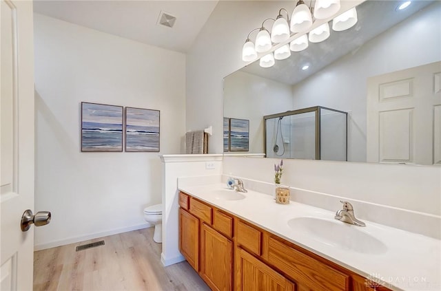 full bathroom with a sink, visible vents, toilet, and a stall shower