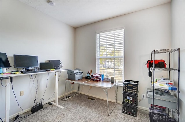 office area featuring baseboards and carpet floors