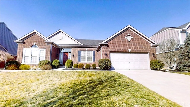 view of front of property featuring a garage, driveway, brick siding, and a front lawn