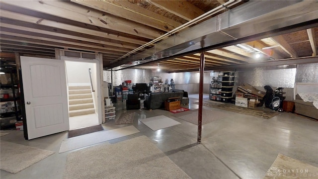 unfinished basement with stairs