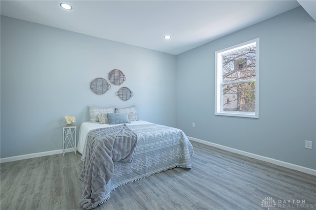 bedroom featuring recessed lighting, baseboards, and wood finished floors