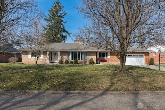 single story home featuring a front yard, concrete driveway, a garage, and a chimney