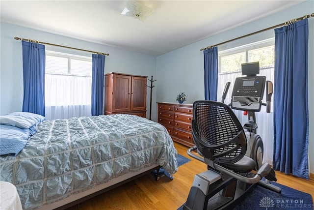 bedroom with light wood-style flooring