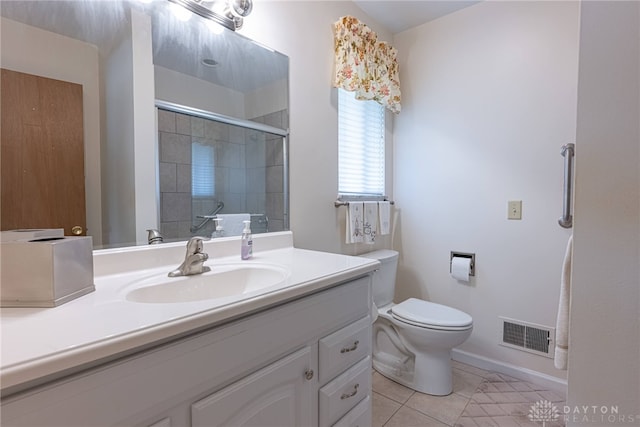 full bath featuring visible vents, toilet, tile patterned flooring, tiled shower, and vanity