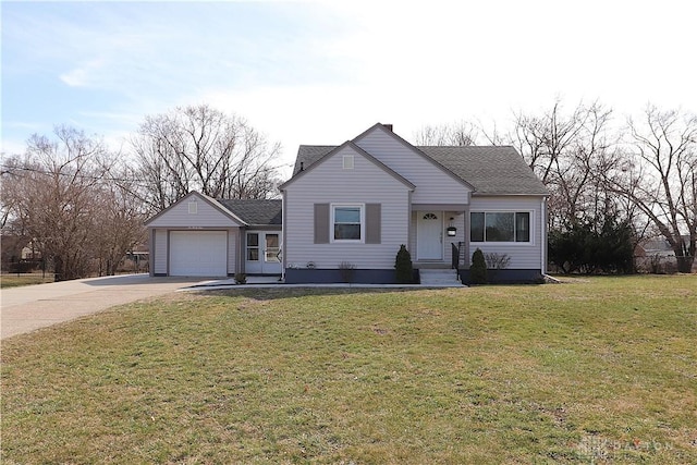 view of front of home with a garage, roof with shingles, concrete driveway, and a front yard