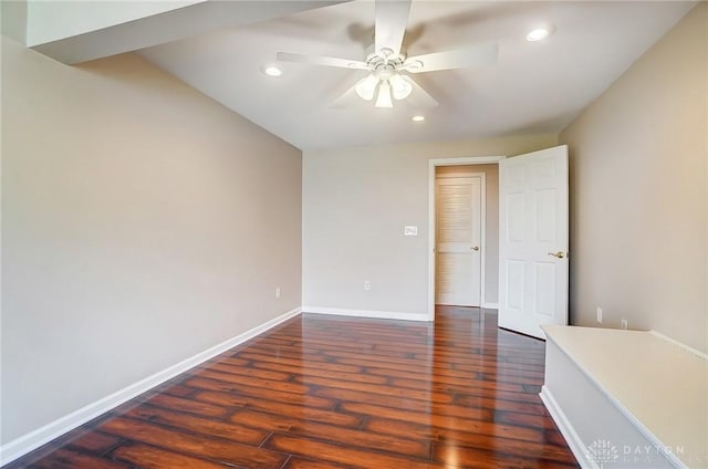 spare room featuring recessed lighting, baseboards, a ceiling fan, and wood finished floors