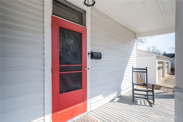 entrance to property featuring a porch