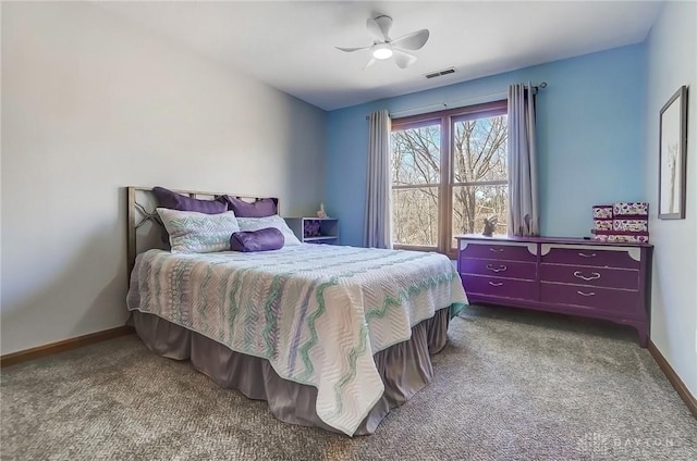 bedroom featuring baseboards, carpet floors, and ceiling fan